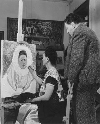Bernard Silberstein Frida paints self-portrait while Diego observes 1940 the Jacques and Natasha Gelman Collection of Mexican Art © Bernard Silberstein ***This image may only be used in conjunction with editorial coverage of Frida Kahlo and Diego Rivera: masterpieces from Jacques and Natasha Gelman Collection 25 Jun - 9 Oct 2016, at the Art Gallery of New South Wales. This image may not be cropped or overwritten. Prior approval in writing required for use as a cover. Caption details must accompany reproduction of the image. *** Media contact: kamal.rana@ag.nsw.gov.au